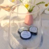 Pinot Gris de la collection Nomade créer par Kluani, est une mini bougie de poche conçue pour vous accompagner partout et vous offrir une parenthèse de douceur où que vous soyez.